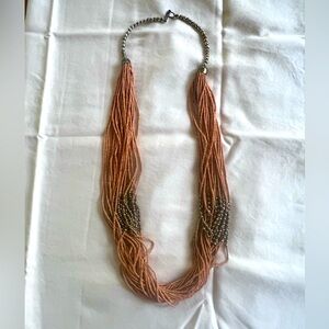 Multi strand tan and silver necklace